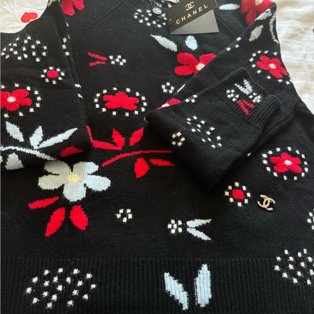 CHANEL Black V-Neck Sweater with Red and White Floral Design
